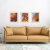 brown sofa 3 paintings