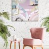 Pink Lamp Above Table And Armchair In Patterned Living Room Inte