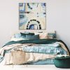 Clock And Flower In Fancy Vase On Nightstand Table Next To King