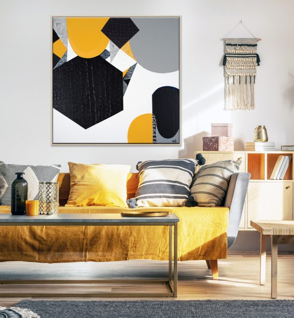 Chic Black Chandelier Above Couch In Contemporary Living Room