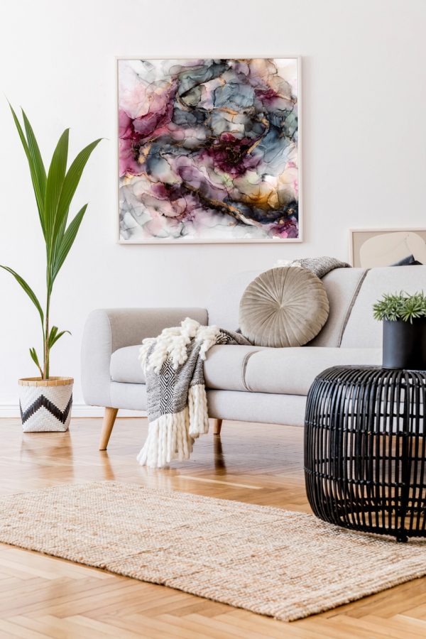 Stylish And Design Home Interior Of Living Room With Gray Sofa, Rattan Table, Lamp, Tropical Leaf, Plaid, Pillows And Elegant Decoration. Abstract Mock Up Paintings Frame On White Walls. Template.