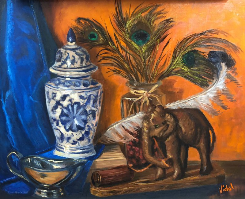 Wooden elephant, Lyrebird and peacock feathers – still life