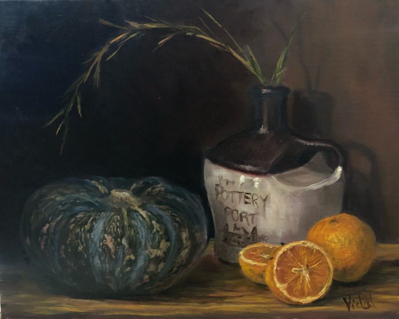 Pumpkin, oranges and pottery – still life