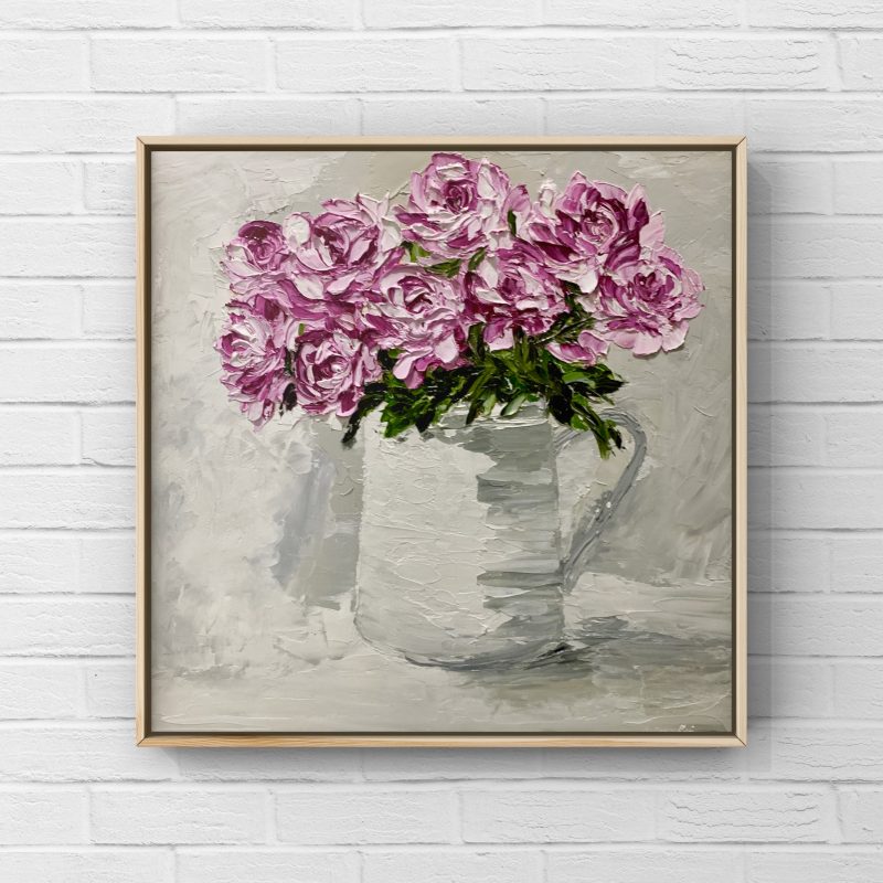 Pink roses in ceramic vase