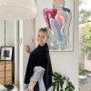 Sarah Jane Hangs Modern Figurative Painting On Wall Titled Bodyline Bold Iv
