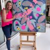 Sarah Jane Stands Next To Happy Painting Bees Plants Titled Pollination Iii Bright Colours