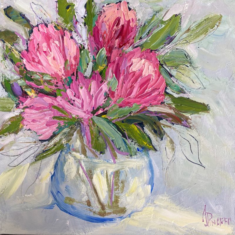 Pink proteas in a vase