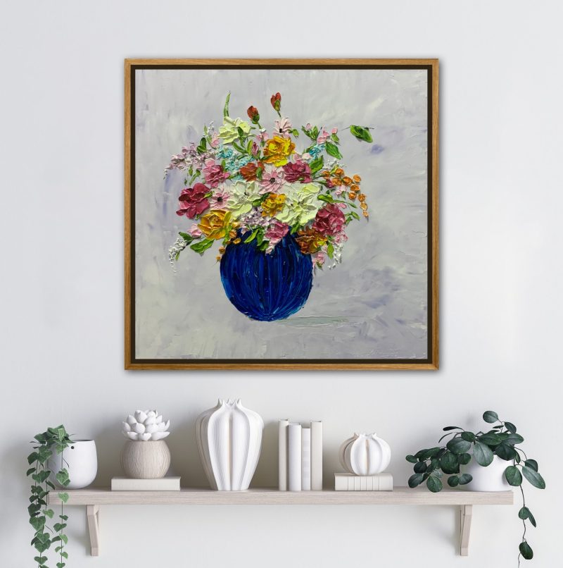 Flowers in navy blue vase