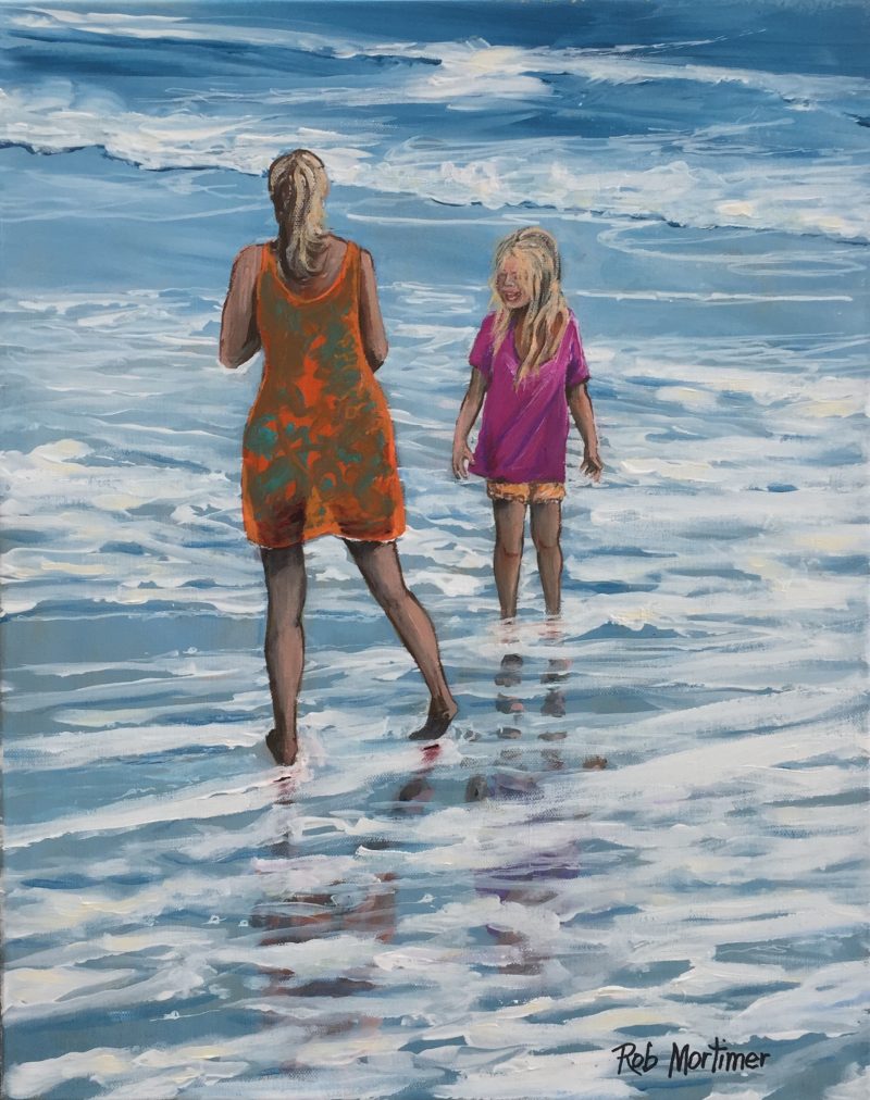 Having fun in the surf shallows