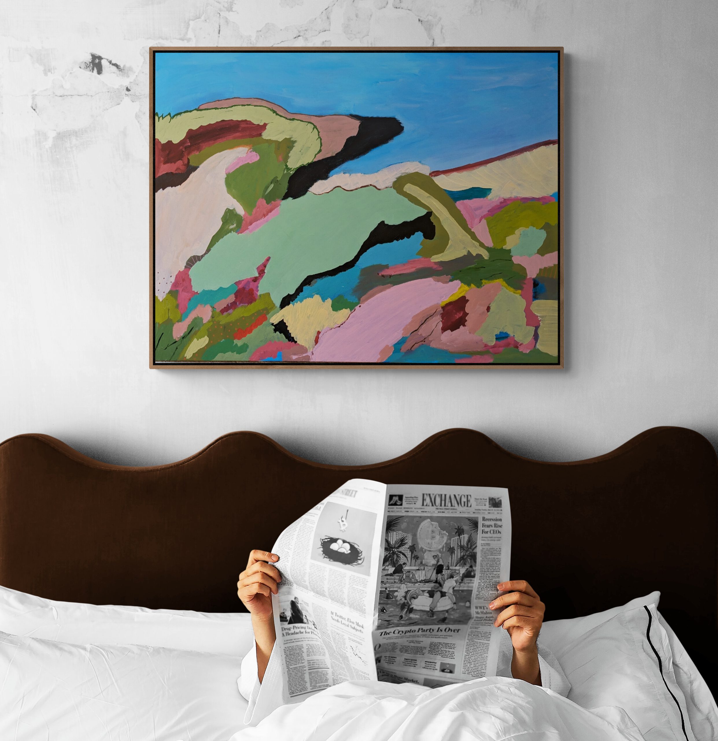 Man Reading Newspaper In Bed