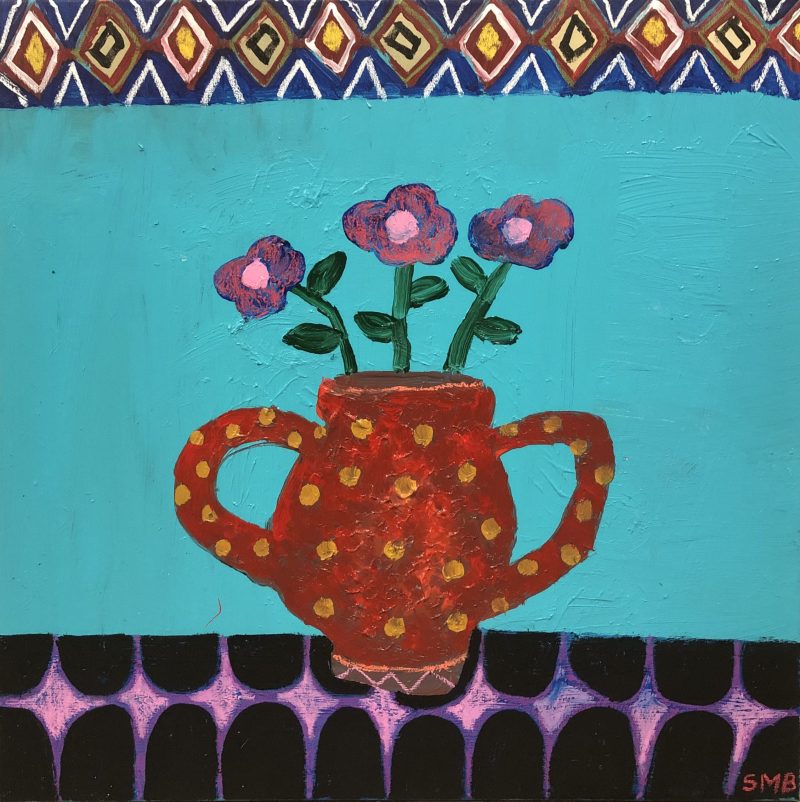 Flowers in spotted vase