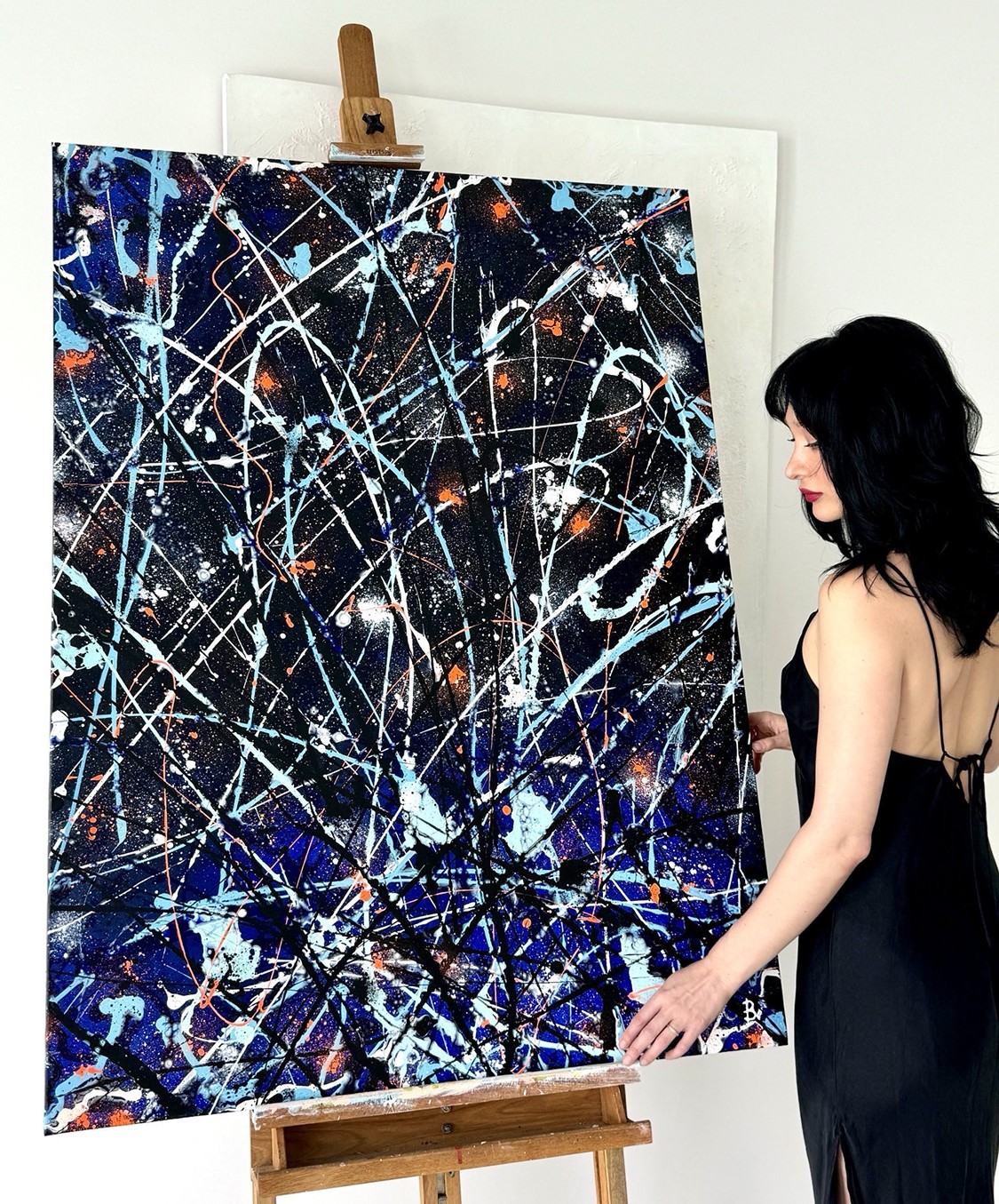 Bridget Bradley Stands With Her Original Abstract Painting Satellite