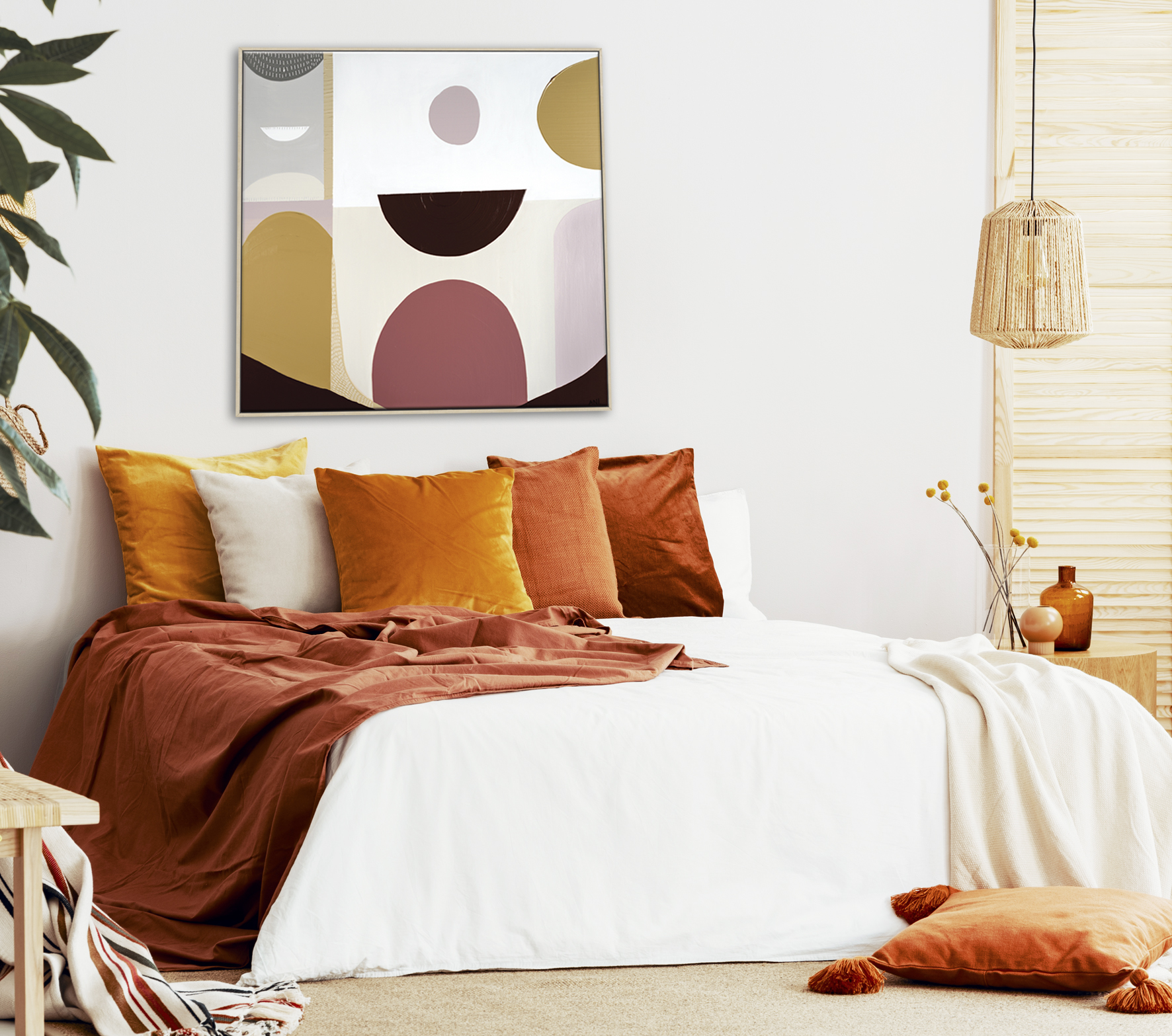 Autumn Colored Pillows And Blanket On King Size Bed In Elegant B