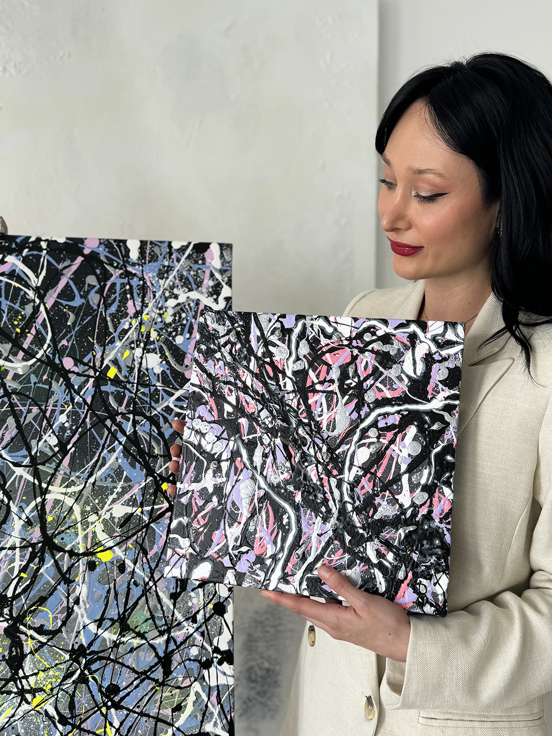 Bridget Bradley Holds Grey V Original Painting From Grey Series