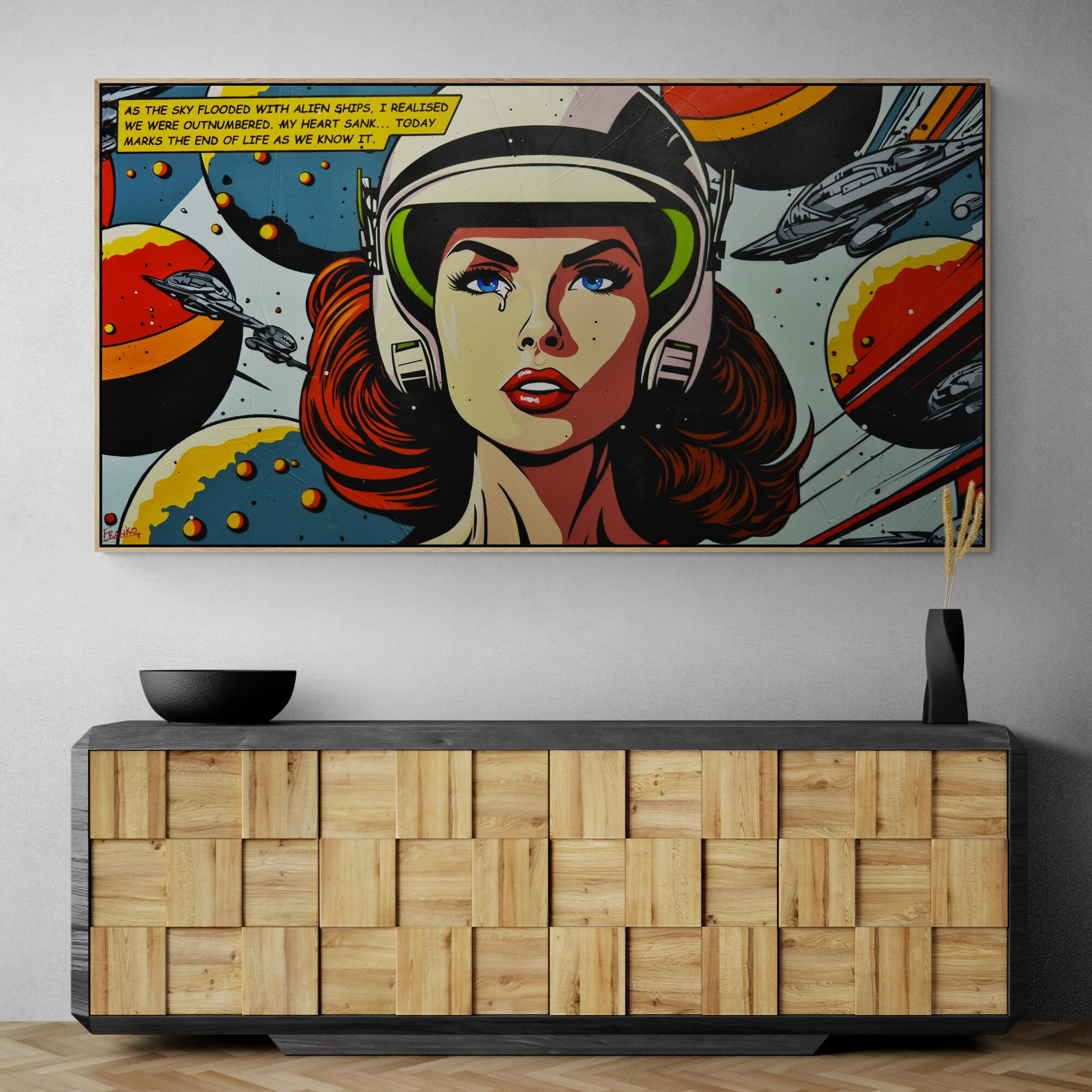 Plant In Black Vase Sitting On Modern Cabinet