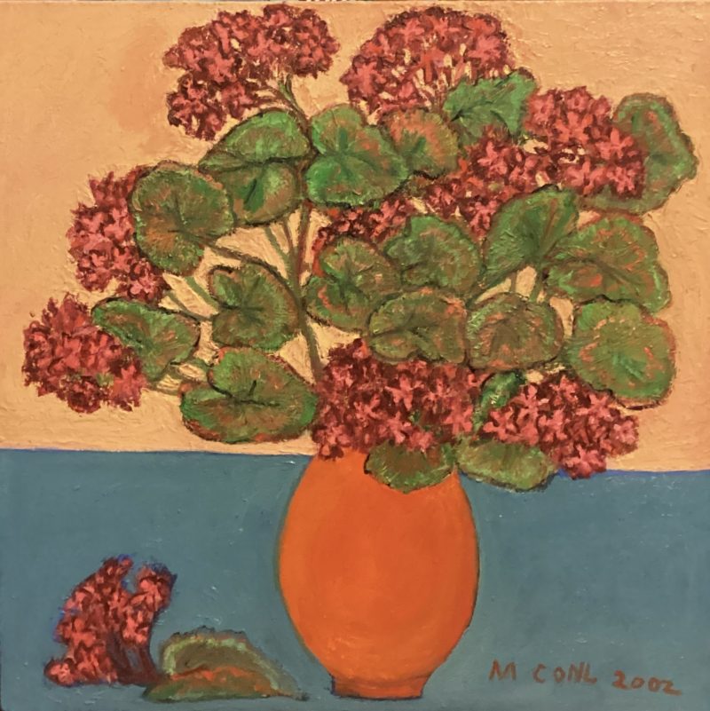 Geraniums in an orange vase
