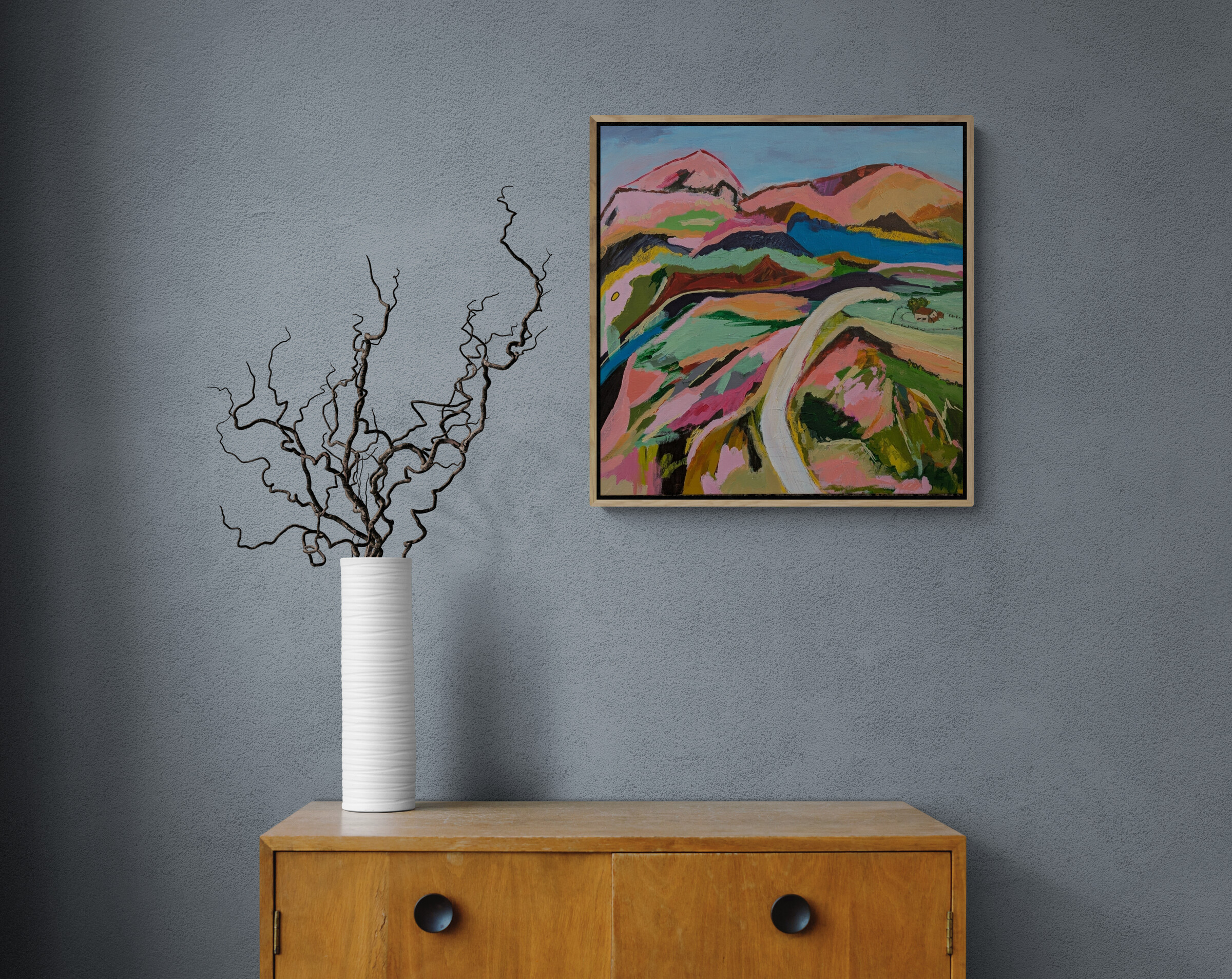 Curly Twigs In Vase Sitting On Cabinet (1)