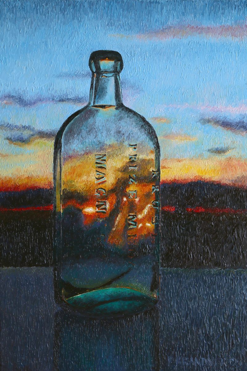 Vintage bottle in sunset
