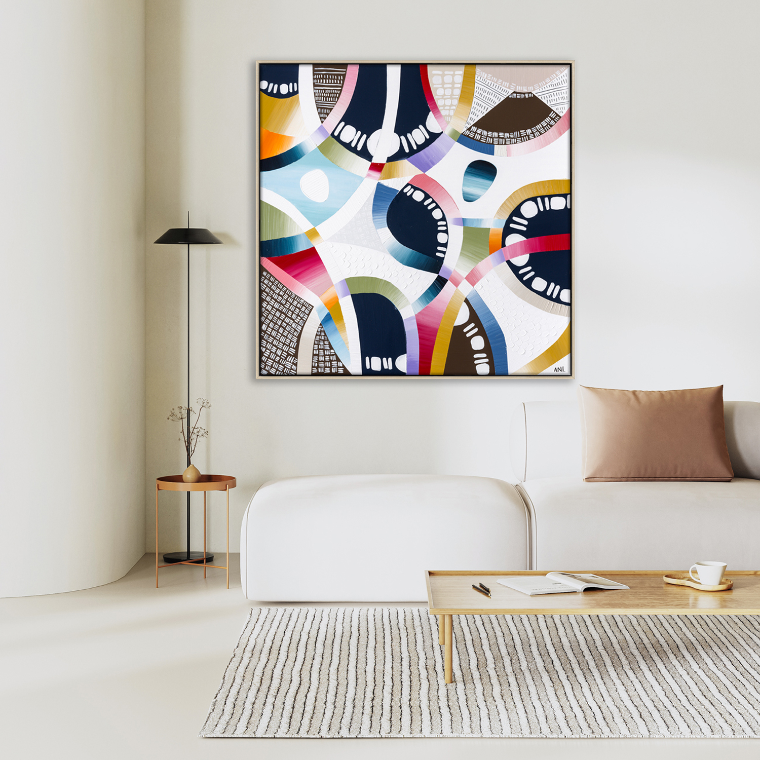 Minimalist Living Room Interior With Curvy Wall, Sofa With Pillows And Beige Plasters Walls, Coffee Table On Rug, Floor Lamp. Interior Mockup, 3d Render