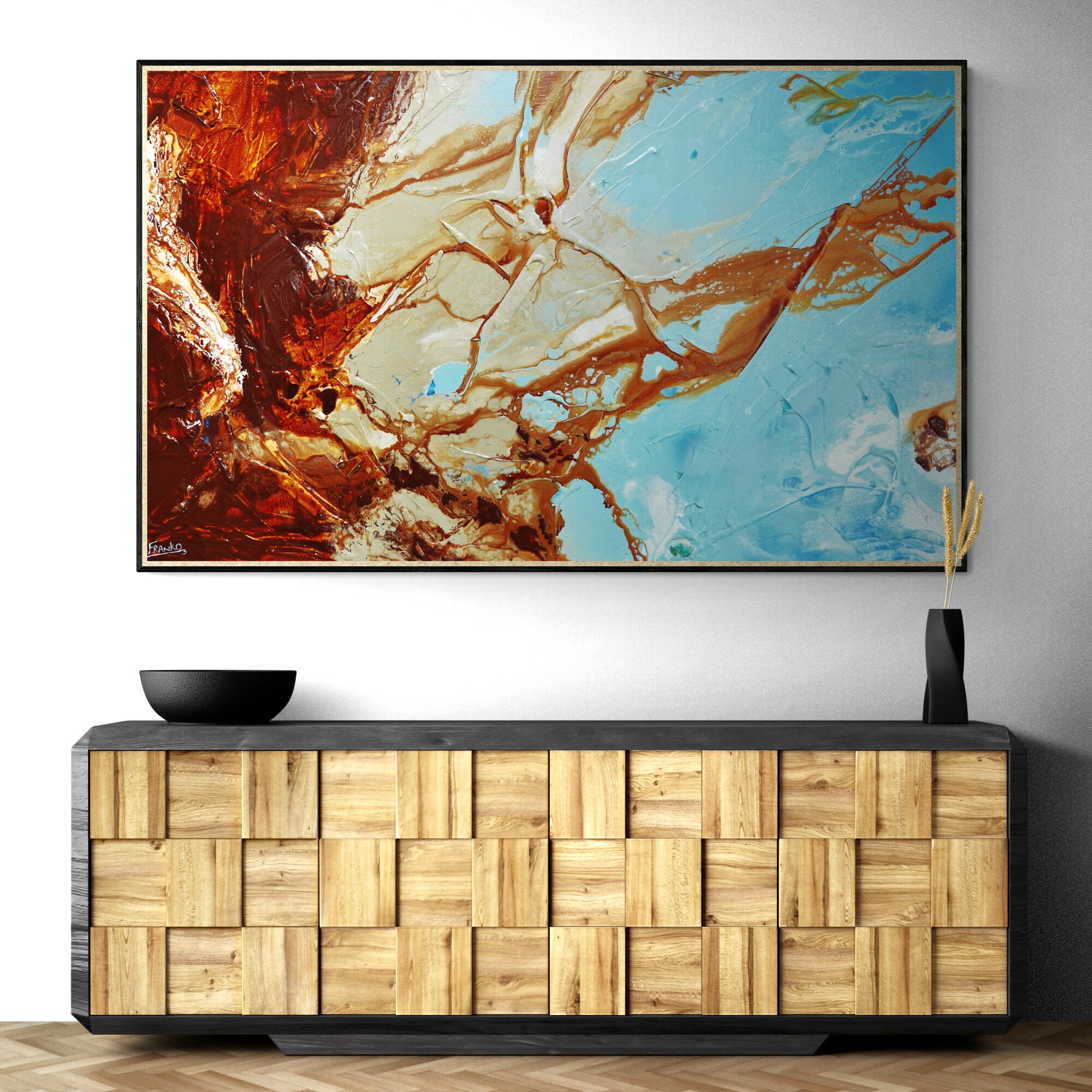 Plant In Black Vase Sitting On Modern Cabinet