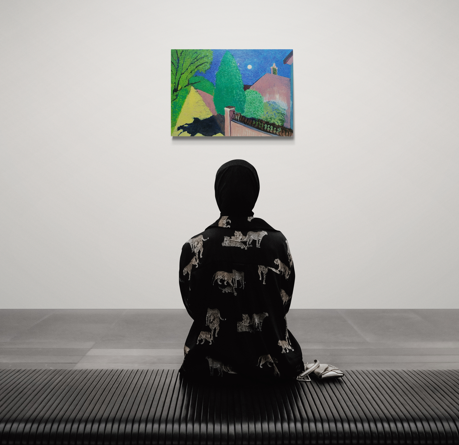 Woman Sitting On A Bench In An Art Gallery